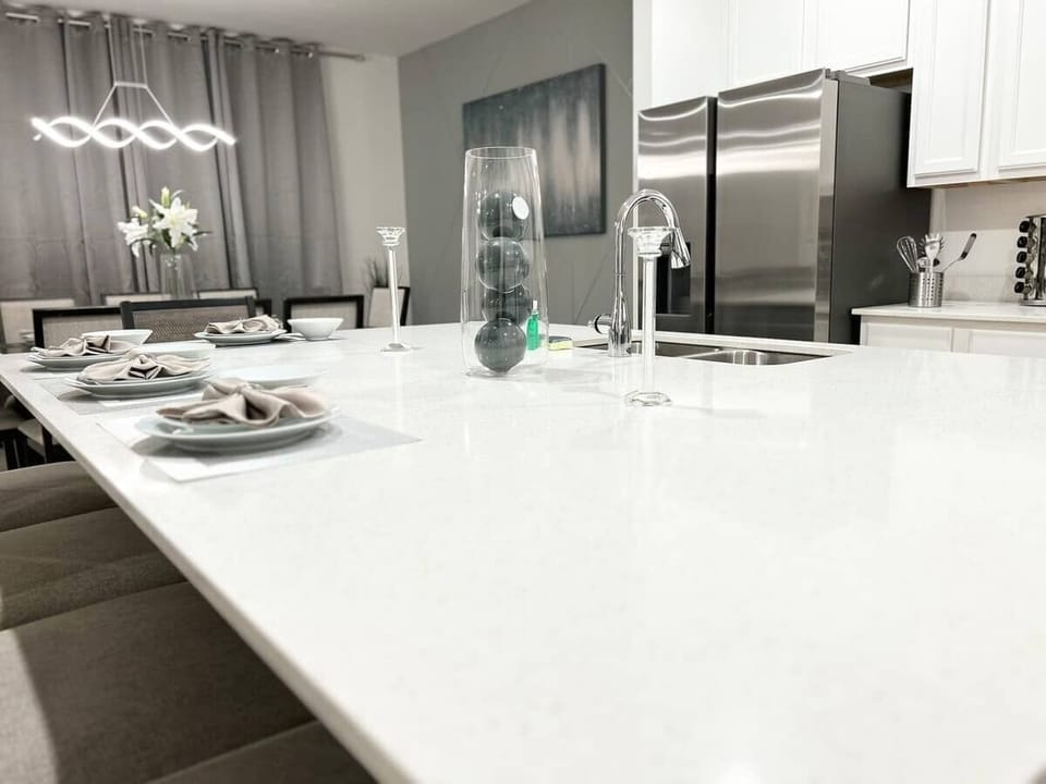 Stunning modern kitchen with quartz island & stainless steel