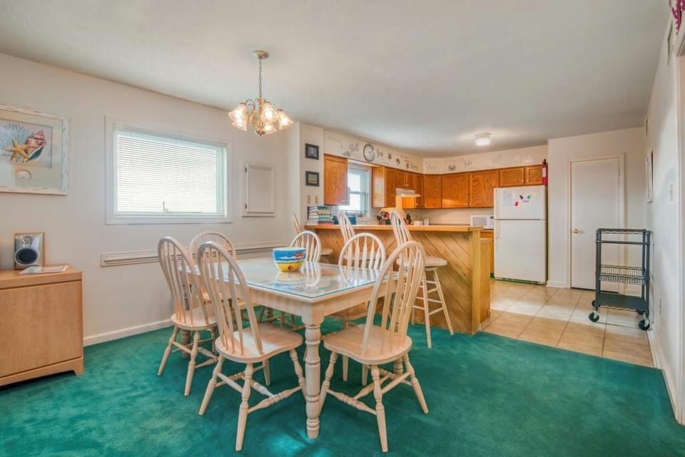 Open floor plan with dining area off from the living room.