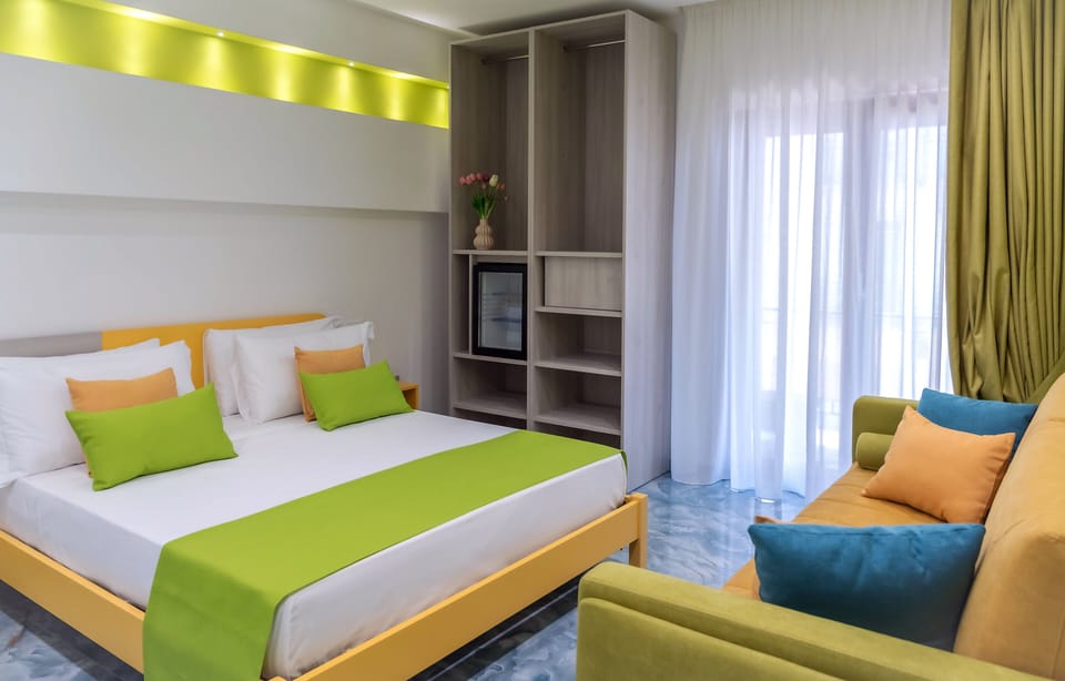 Family Room, City View | In-room safe, blackout drapes, soundproofing, free WiFi