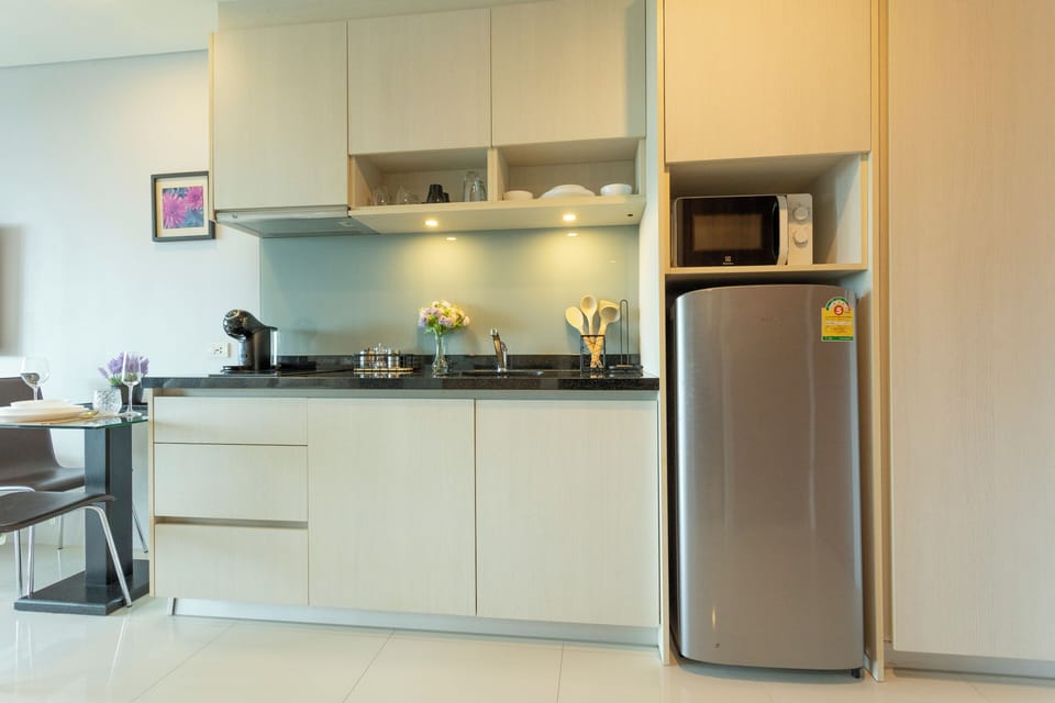 Basic Condo | Private kitchen | Fridge, stovetop, cookware/dishes/utensils
