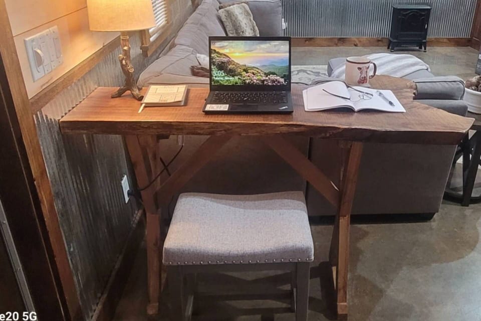 Cozy workspace at White Tail Fawn for catching up on emails or planning a day of adventure!