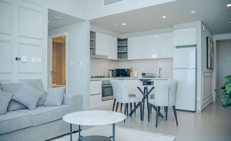 Spacious living area with an open-plan kitchen and dining table, creating a seamless flow for entertaining.