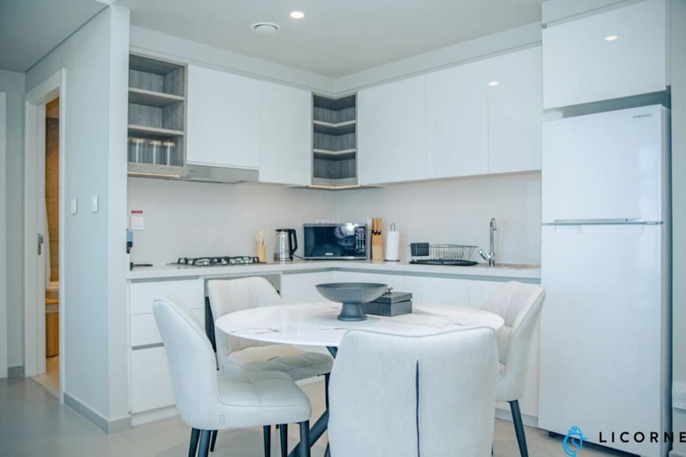 Fully equipped modern kitchen with sleek appliances, ready for all your cooking needs.