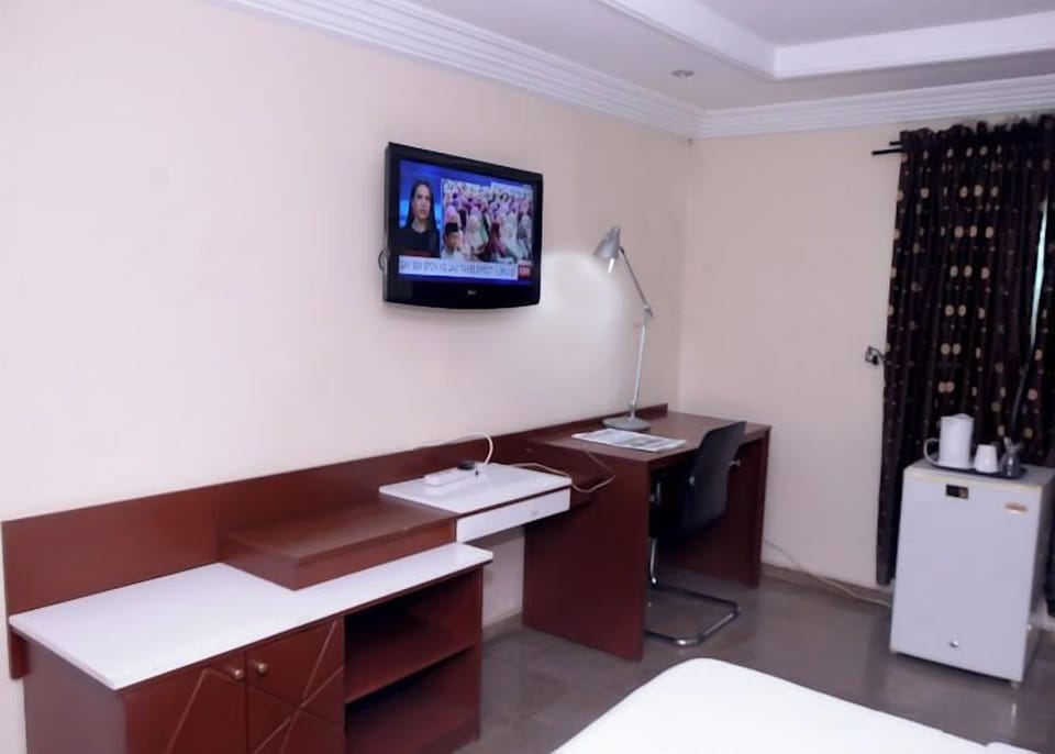 Comfort Room, Balcony, City View | Desk, laptop workspace, free WiFi