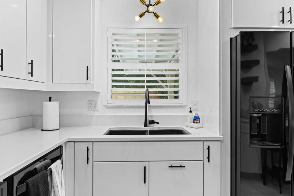 Beautifully appointed kitchen which opens to the living space