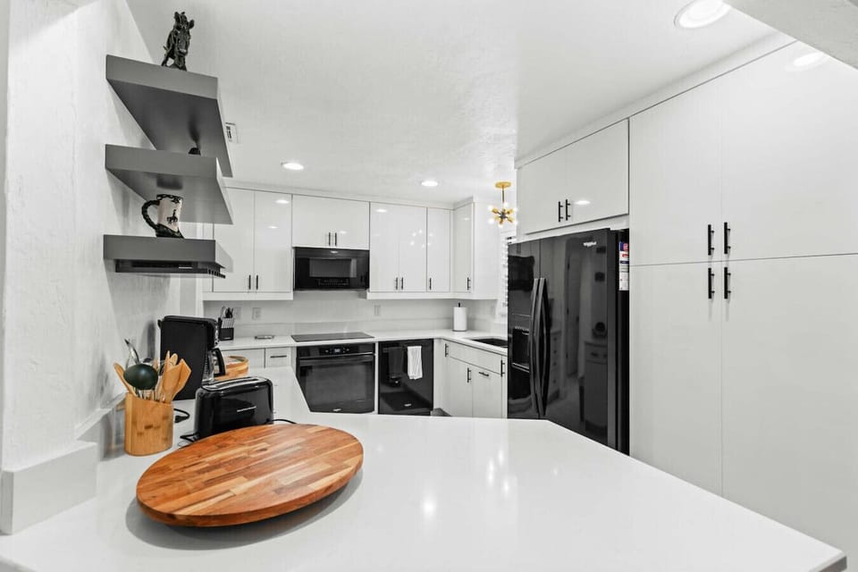 Beautifully appointed kitchen which opens to the living space