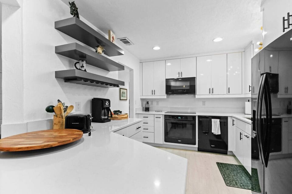 Beautifully appointed kitchen which opens to the living space