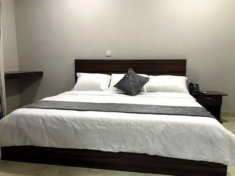 Deluxe Room, Balcony, City View | Desk, laptop workspace, free WiFi