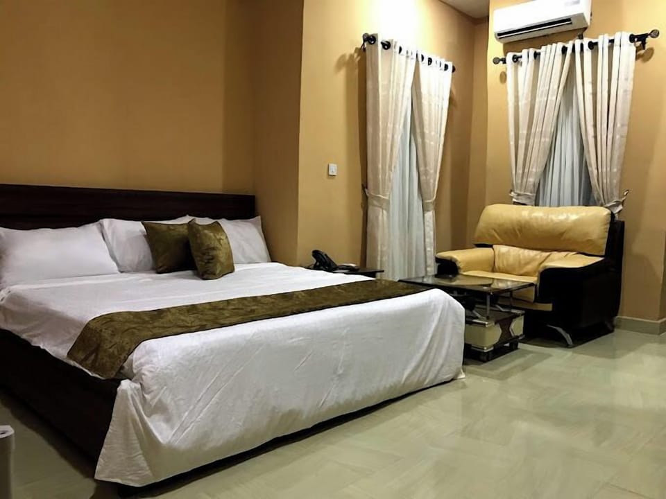 Deluxe Room, Balcony, City View | Desk, laptop workspace, free WiFi