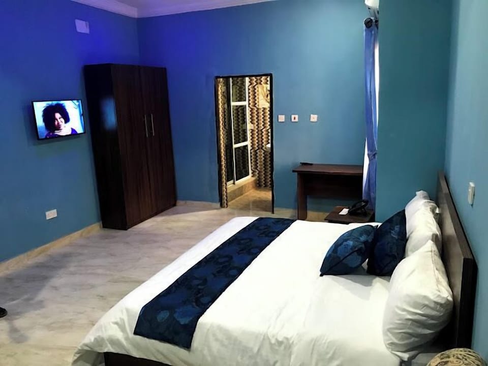 Deluxe Room, Balcony, City View | Desk, laptop workspace, free WiFi