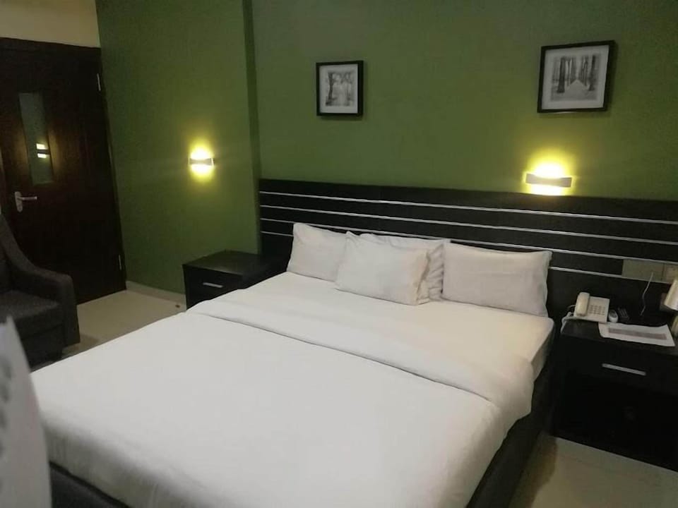 Deluxe Room, Balcony, City View | Desk, laptop workspace, free WiFi