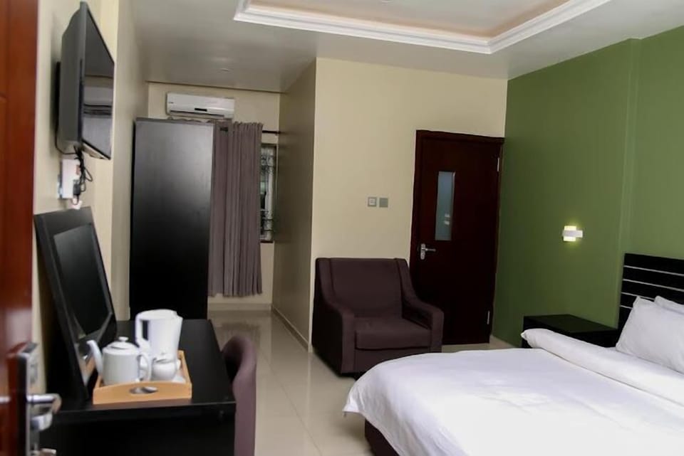 Deluxe Room, Balcony, City View | Desk, laptop workspace, free WiFi