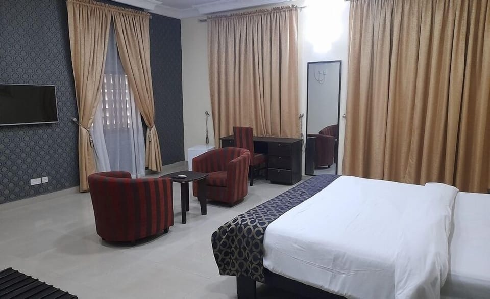 Deluxe Room, Balcony, City View | Desk, laptop workspace, free WiFi