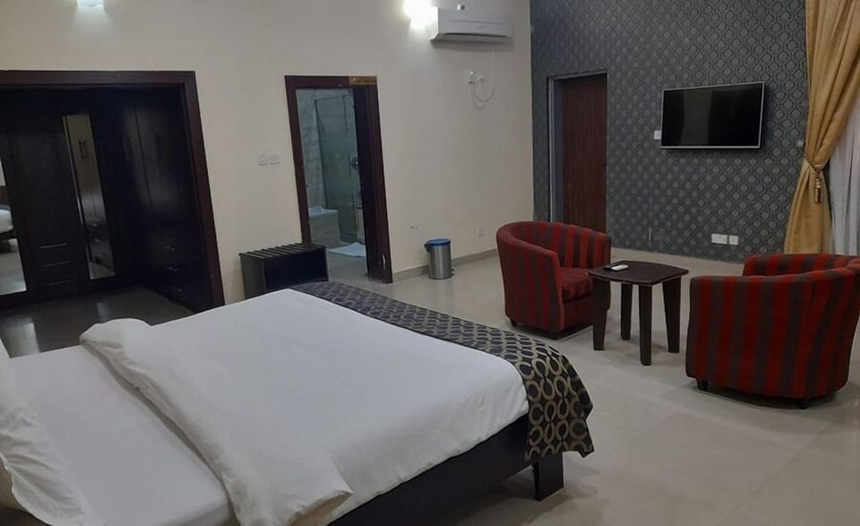 Deluxe Room, Balcony, City View | Desk, laptop workspace, free WiFi