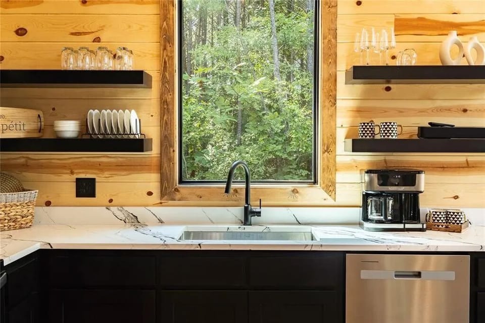 Kitchen is stocked with all you would need to prepare a meal.
