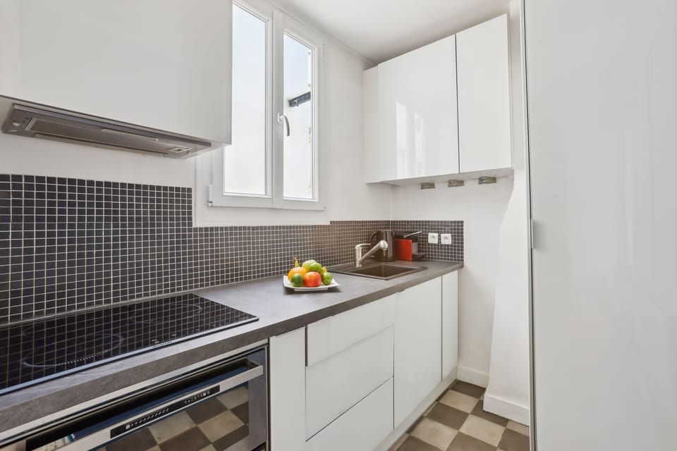 The kitchen is fully equipped to prepare a simple meal