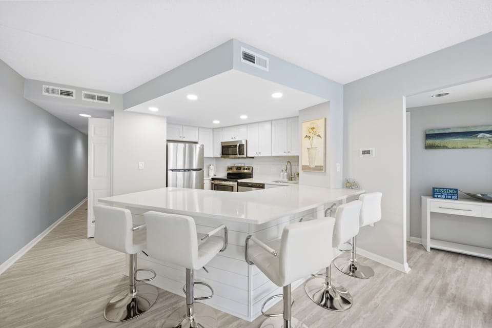 Gather 'round the breakfast bar and enjoy mealtime together.