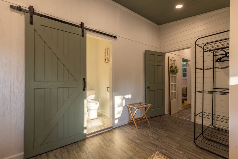Ensuite bathroom and space to unpack suitcases.