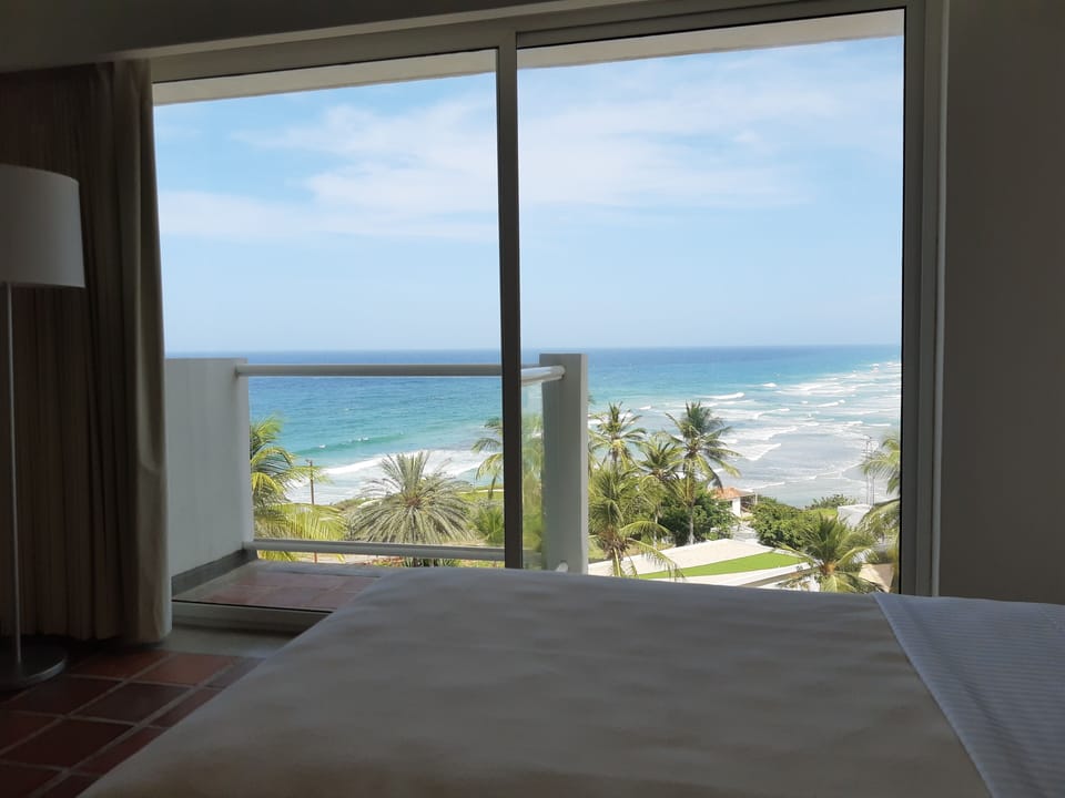 Premium Double Room, Balcony, Sea View | Desk, laptop workspace, iron/ironing board