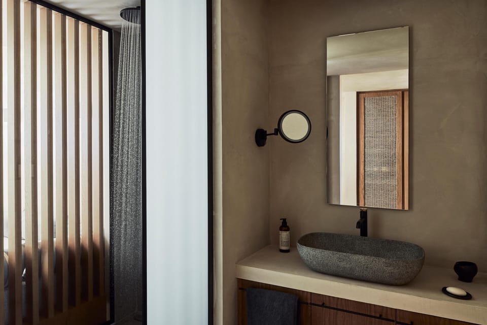 Shower, free toiletries, hair dryer, slippers