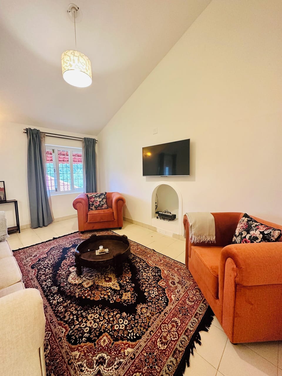 Deluxe Villa, Garden View | Living area | Fireplace