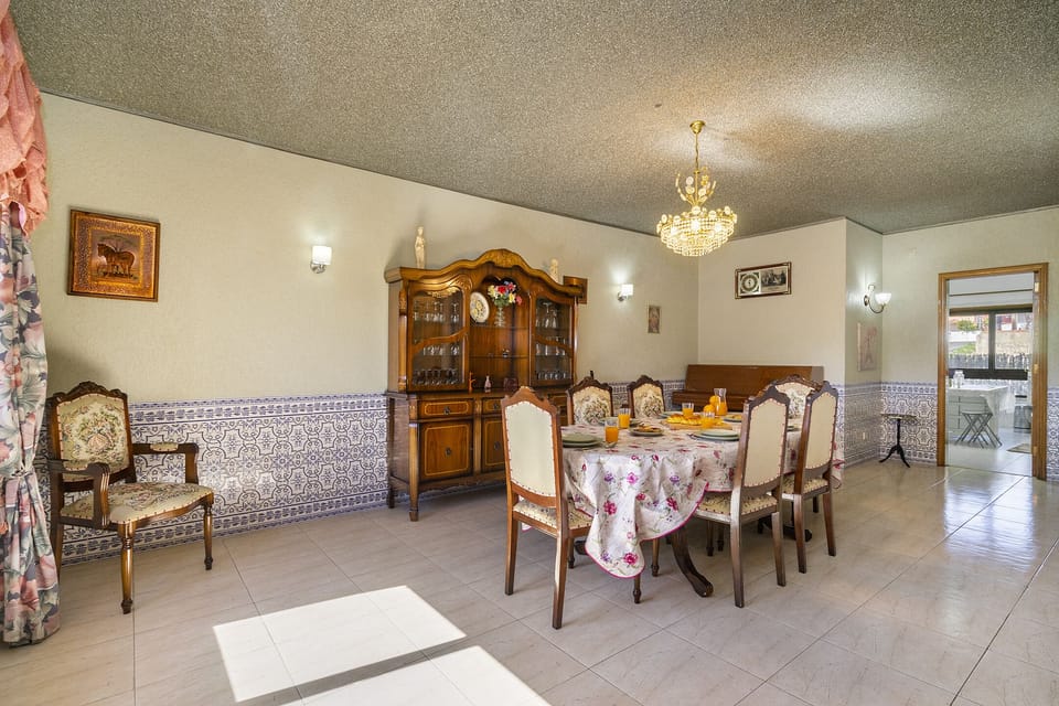 Apartment, 4 Bedrooms | Living area | Flat-screen TV