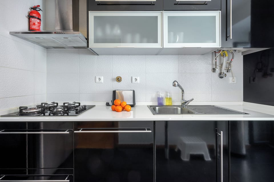 Apartment, 2 Bedrooms | Private kitchen | Fridge, electric kettle, toaster