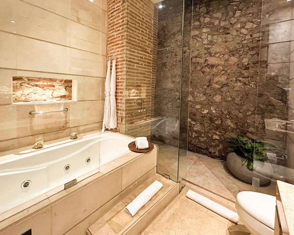 Superior Room, 1 King Bed, Hot Tub | Bathroom | Free toiletries, hair dryer, towels, soap