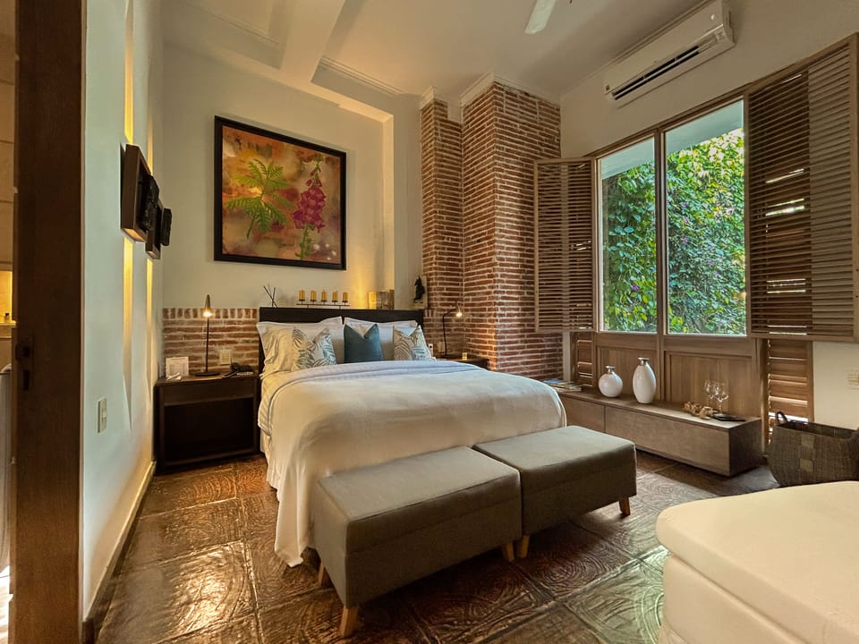 Superior Room, 1 Queen Bed | Minibar, in-room safe, blackout drapes, iron/ironing board
