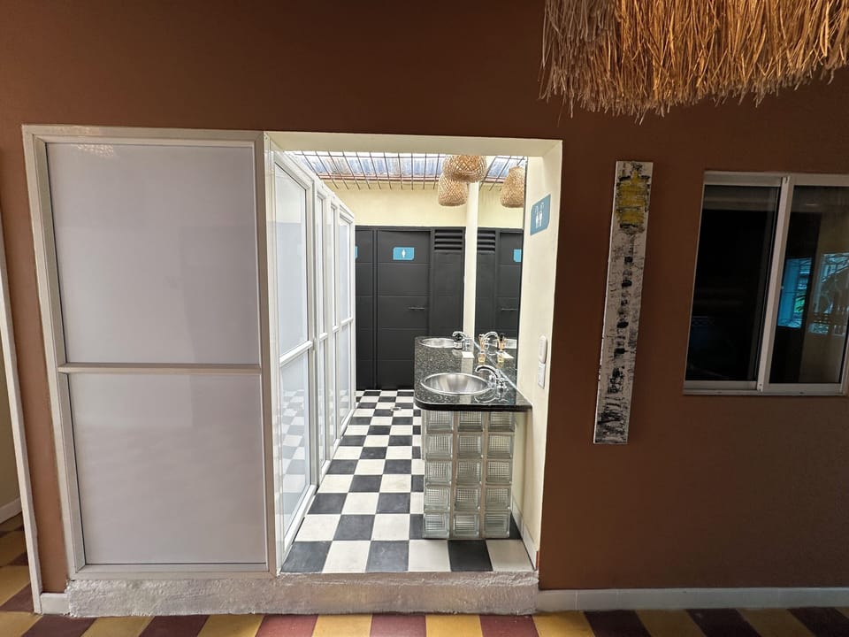 Shower, rainfall showerhead, towels, soap