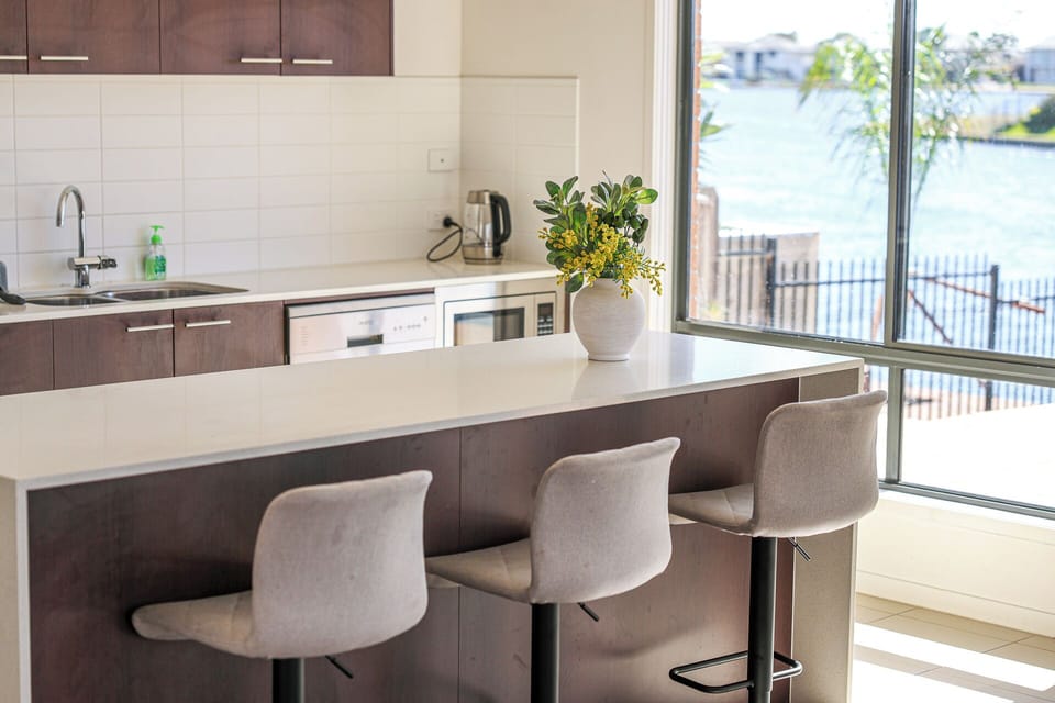 Deluxe House, Lake View | Living area | Flat-screen TV