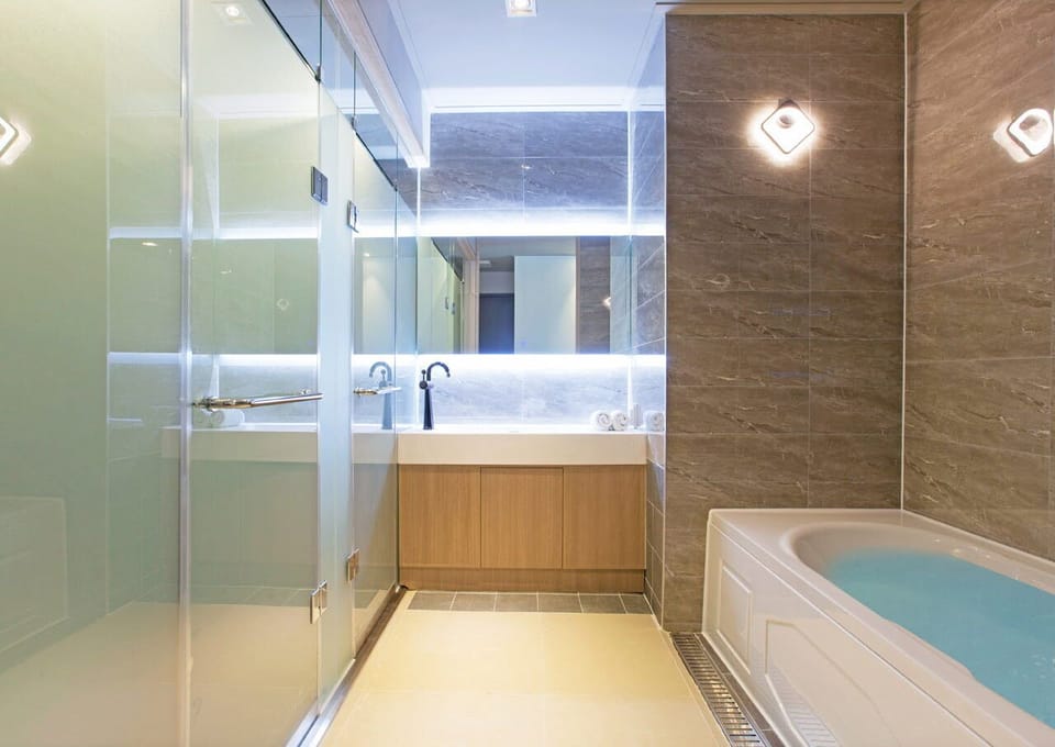 Premium Twin Room, Ocean View | Bathroom | Shower, hair dryer, bathrobes, bidet