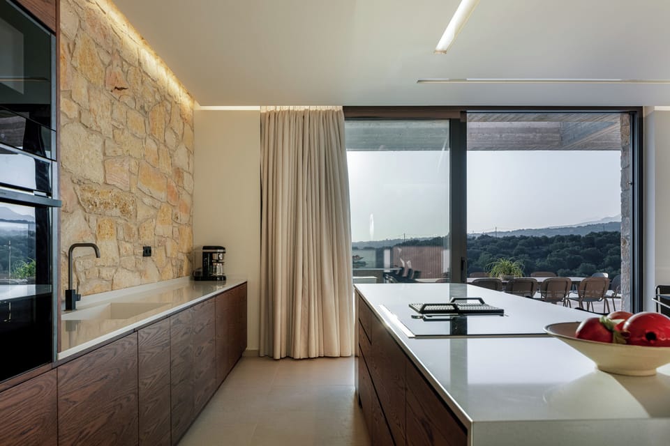 The fully equipped kitchen features top-of-the-line appliances, perfect for a self-catered holiday