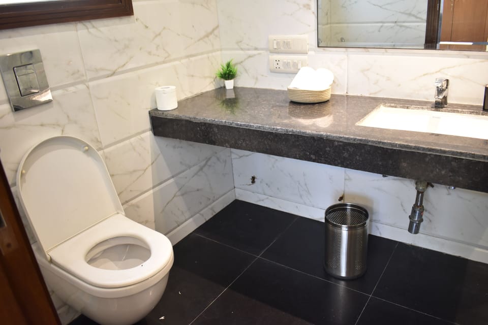 Deluxe Double Room, City View | Bathroom | Shower, bidet, towels, soap