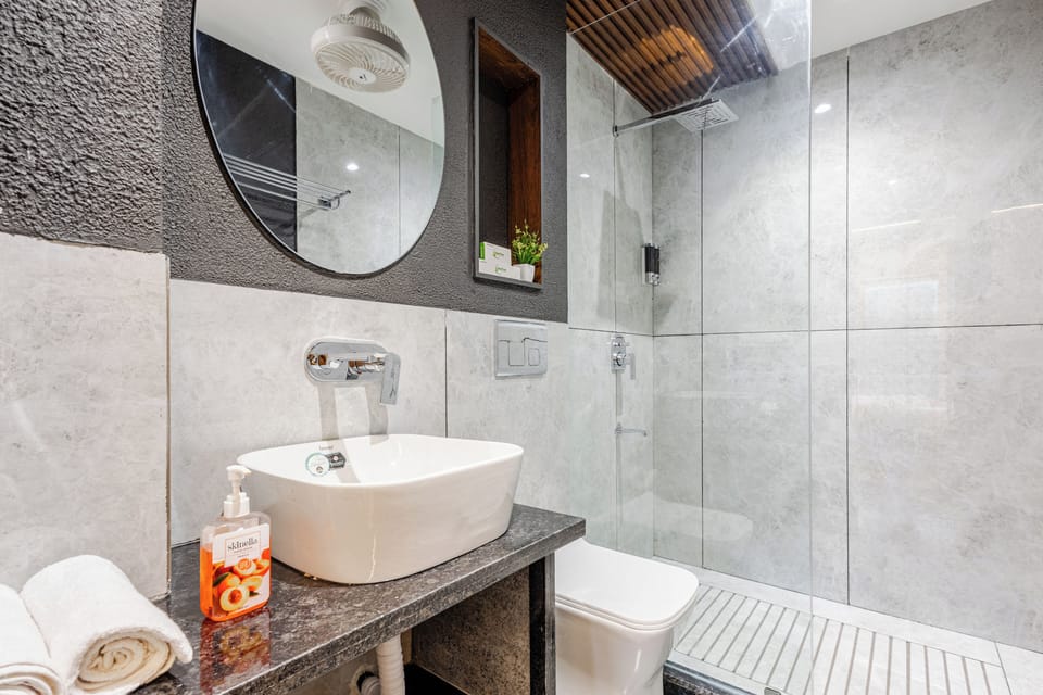 Superior Studio, Balcony, City View | Bathroom | Shower, rainfall showerhead, hair dryer, towels