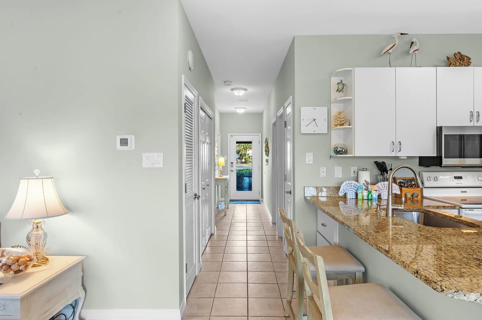 Deluxe Condo, 2 Bedrooms, Non Smoking, Balcony | Private kitchen | Fridge, microwave, oven, stovetop