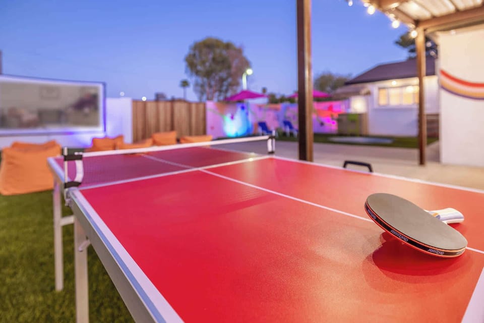 Serve up some fun with an exciting game of ping pong under the twinkling lights!