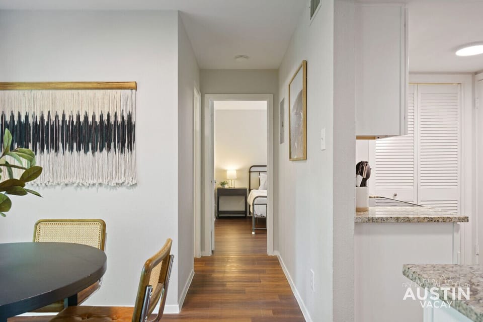 Head down the hall on the main floor to the main floor primary bedroom