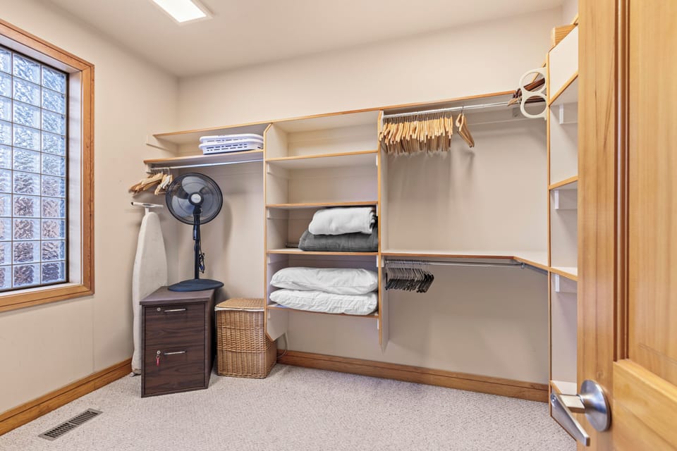 The walk-in closet with plenty of storage space.