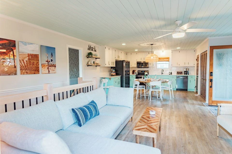 A look from the upper deck into the living room and kitchen area.