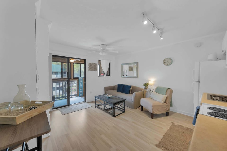 Curl up in the airy living room & enjoy a movie night at home