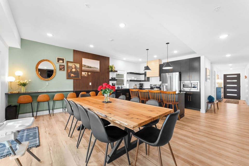 Custom live-edge dining table for 10 plus counter seating—perfect for group meals and memories.