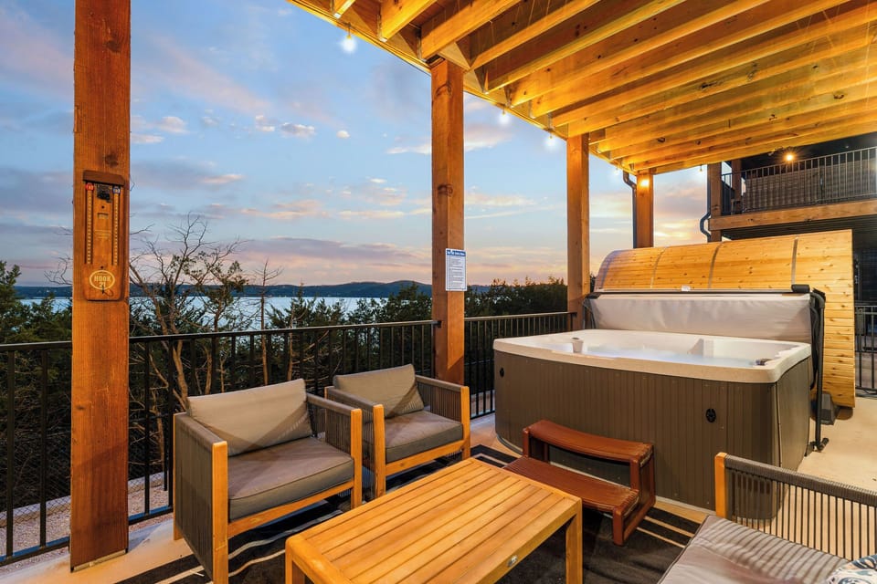 Enjoy unbeatable lakefront views, a hot tub, barrel sauna, and more—feel like you’re on the water while relaxing indoors.
