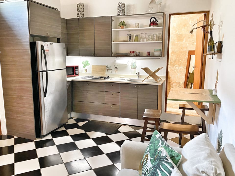 A well-equipped kitchen, everything you need for coffee, snacks, or light meals.