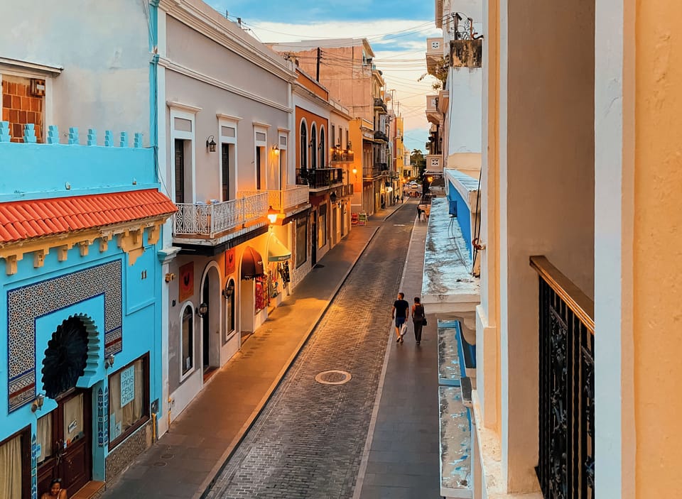 The vibrant street scene outside the building.