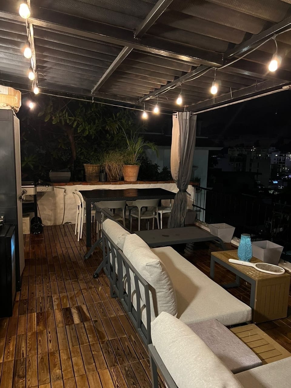Rooftop with sitting, dining and BBQ areas and stunning panoramic views