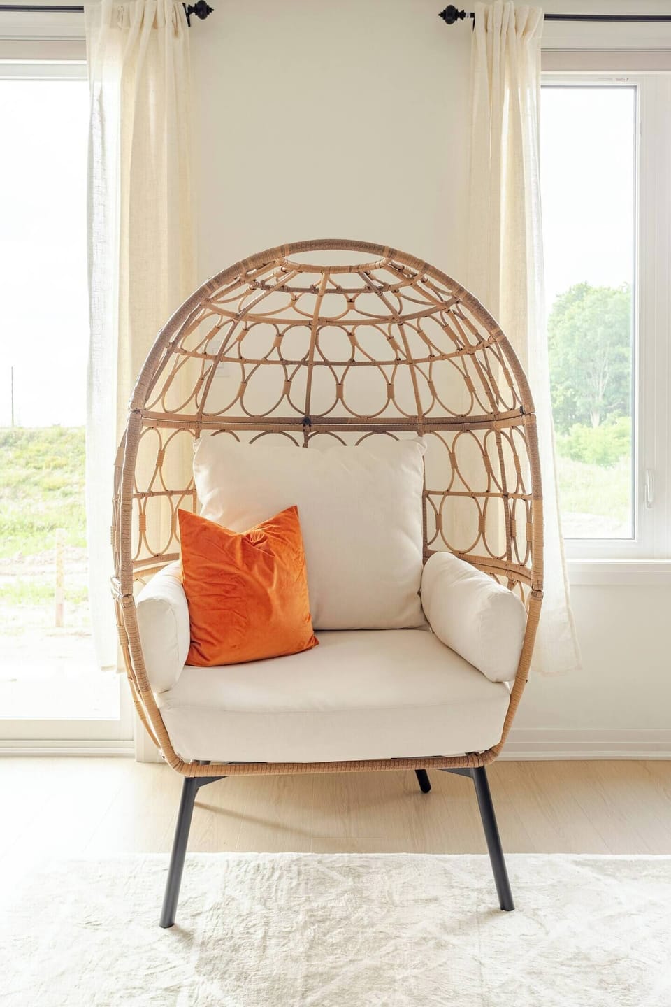 This unique and comfy wicker egg chair is the perfect spot to relax and unwind. Curl up with a good book, sip on your favorite beverage, or just enjoy the peaceful ambiance. 