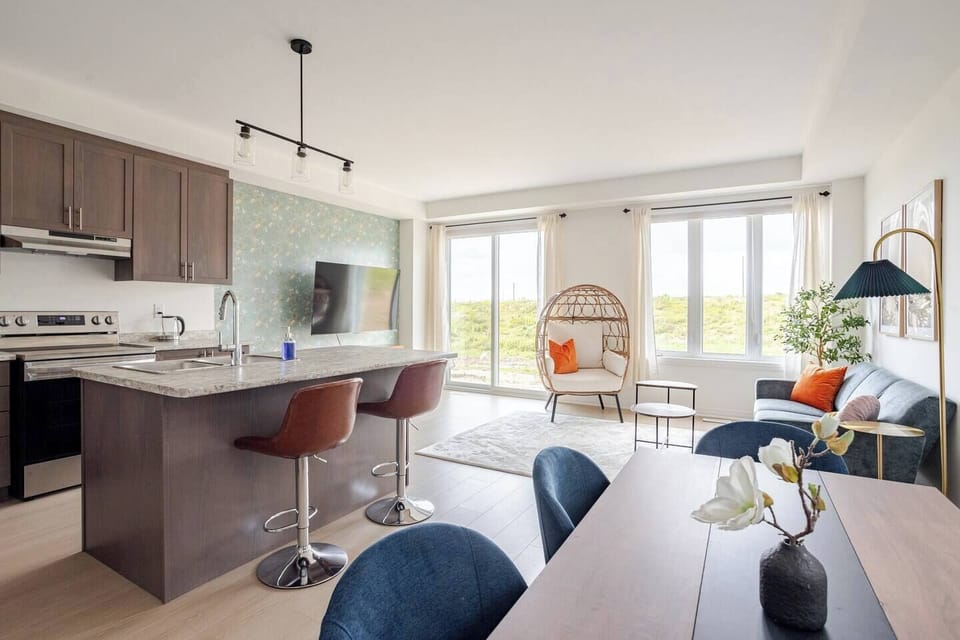 Modern, cozy apartment with stylish decor, great views, and a fully equipped kitchen.


