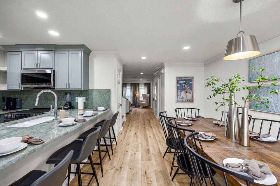 Plenty of seating with enough chairs for 12 to dine comfortably