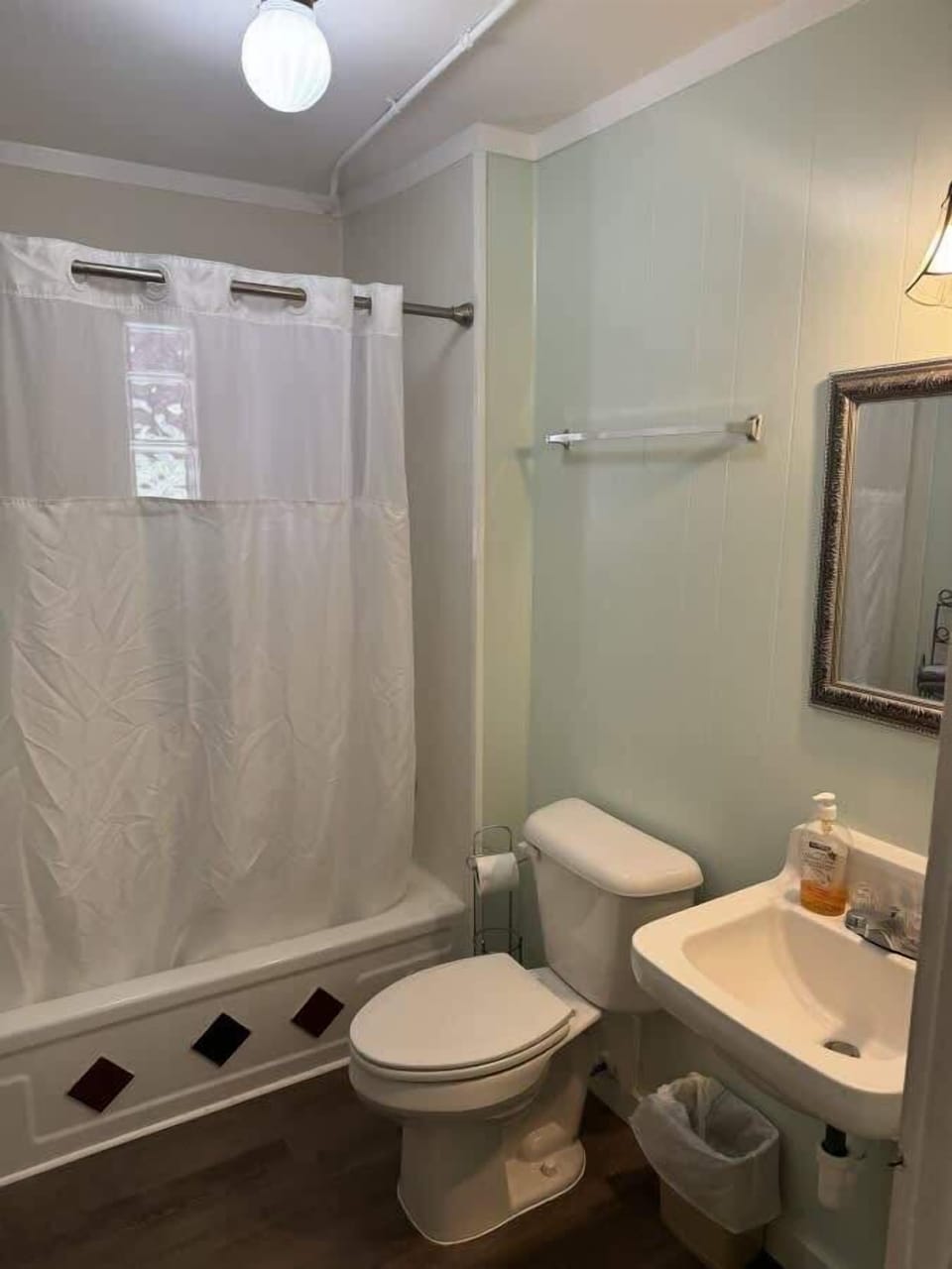 Bathroom with tub and shower